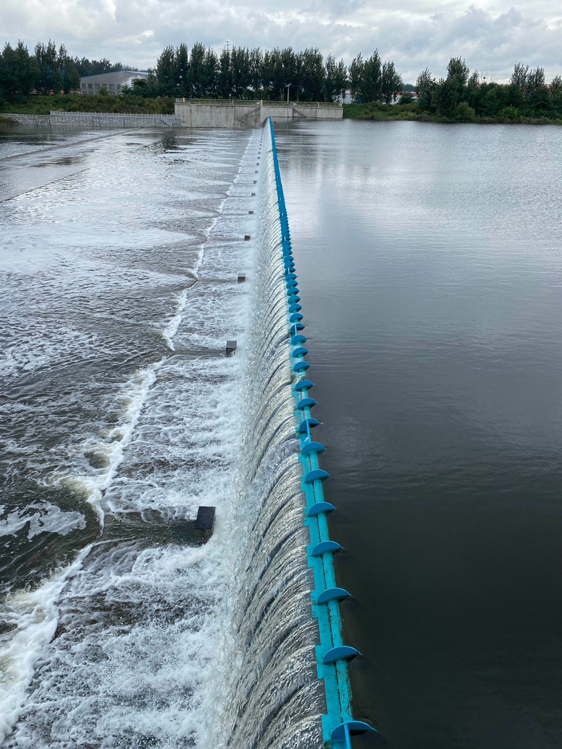 Raised weir in action